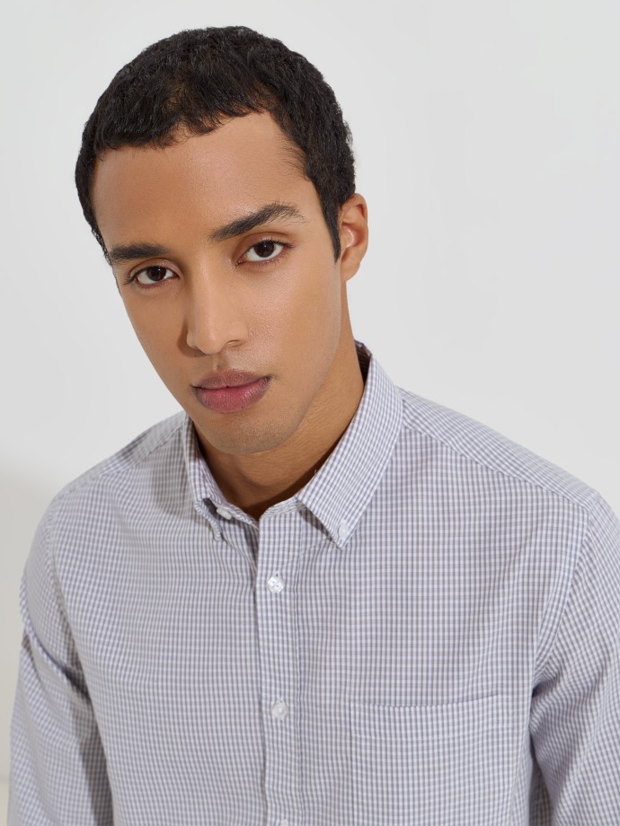 Camisa aos quadrados com bolso