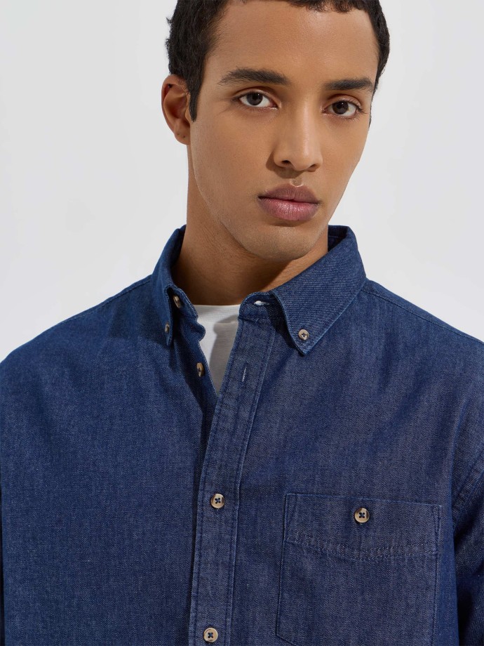 Camisa de ganga com bolso