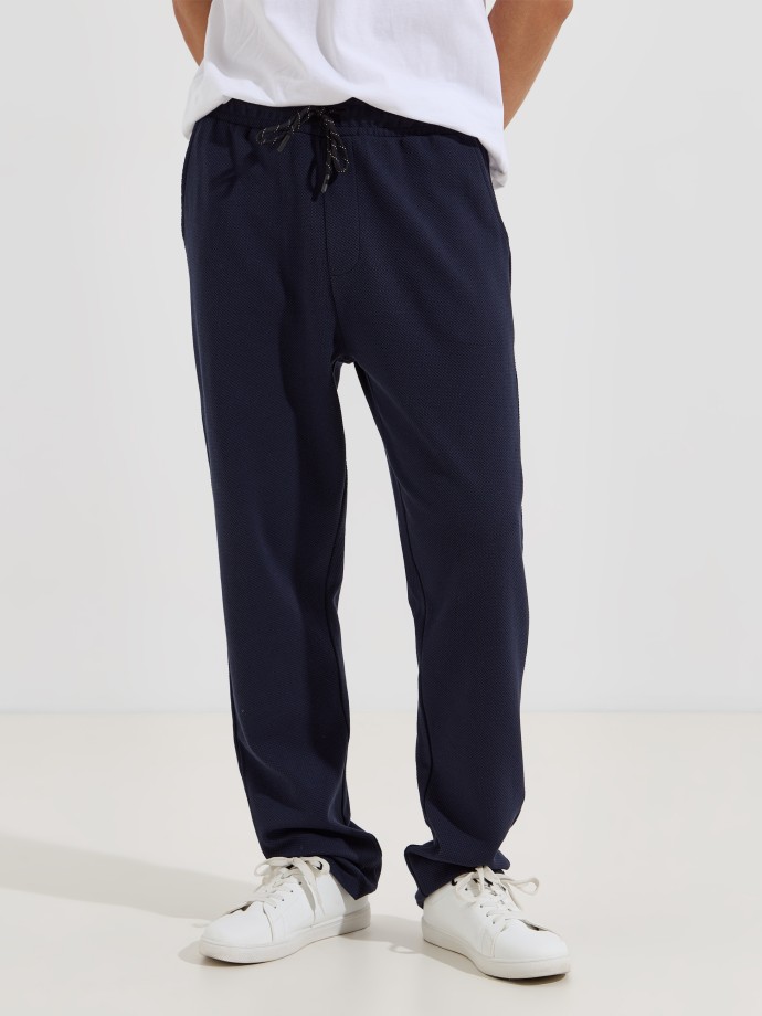 Cal�as em malha piquet