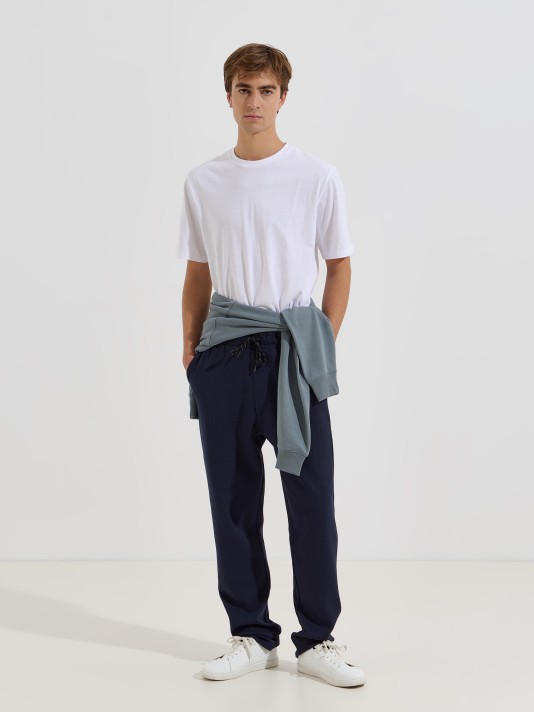 Cal�as em malha piquet