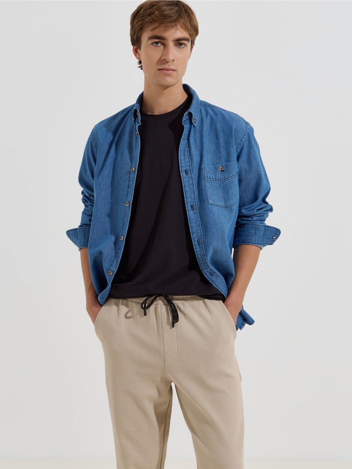 Cal�as em malha piquet