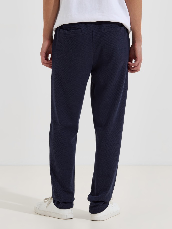 Cal�as em malha piquet