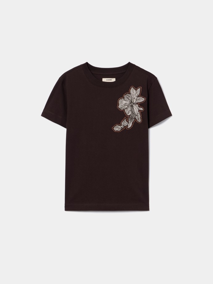 T-shirt estampada com missangas