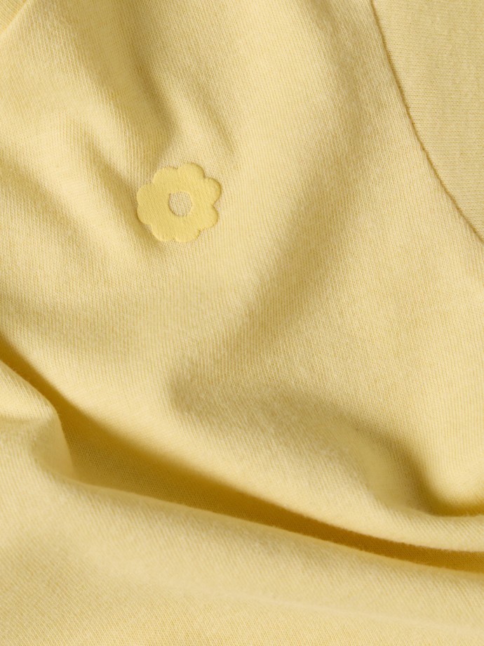 T-shirt com flor estampada