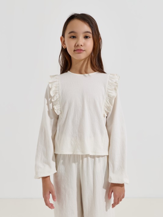 Blusa com folhos nos ombros