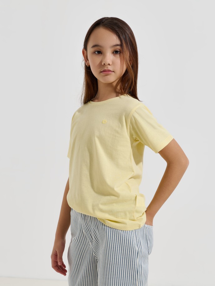 T-shirt com flor estampada T-shirt com flor estampada