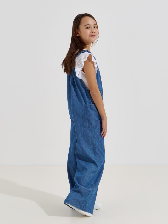 Macacão denim com alças elásticas Macacão denim com alças elásticas