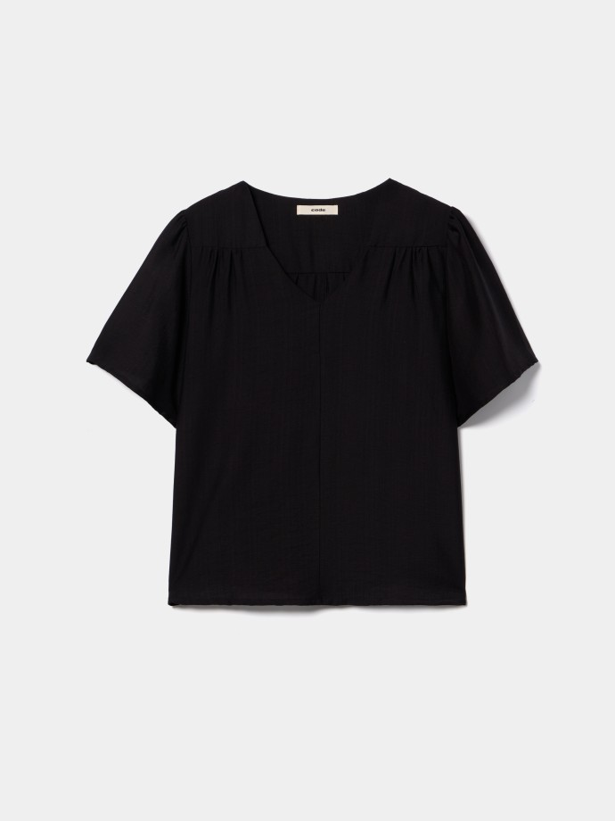 Blusa flu�da estampada decote em V
