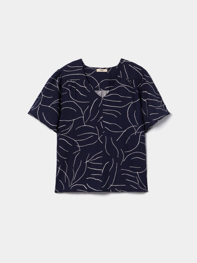 Blusa flu�da estampada decote em V