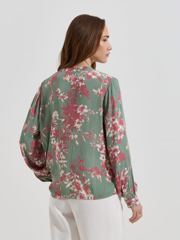 Blusa floral com decote em V