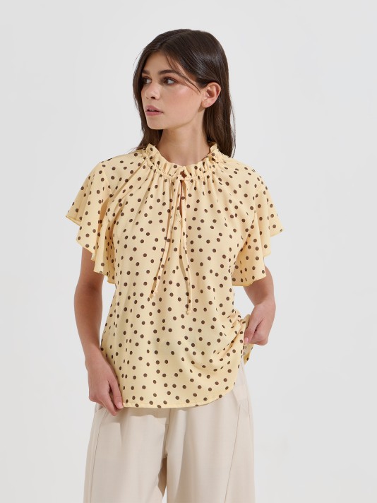 Blusa com estampado de bolas