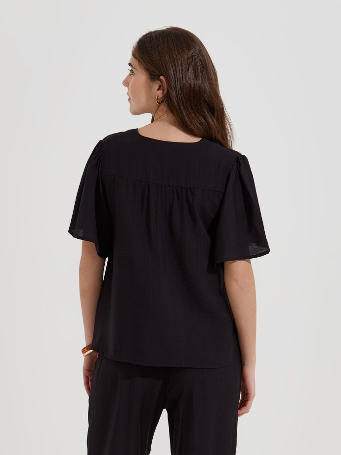 Blusa flu�da estampada decote em V