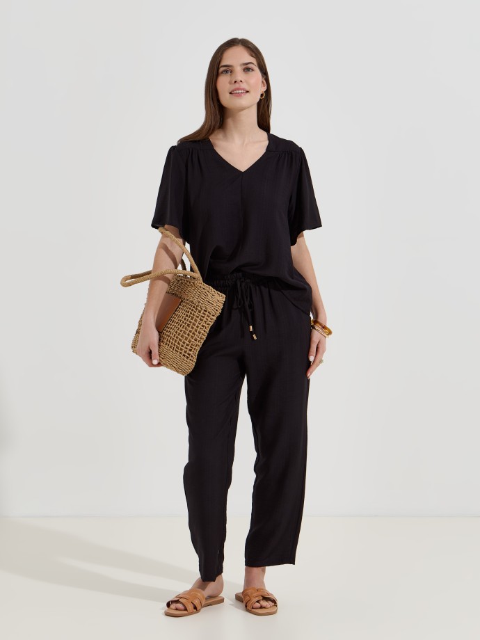 Blusa flu�da estampada decote em V