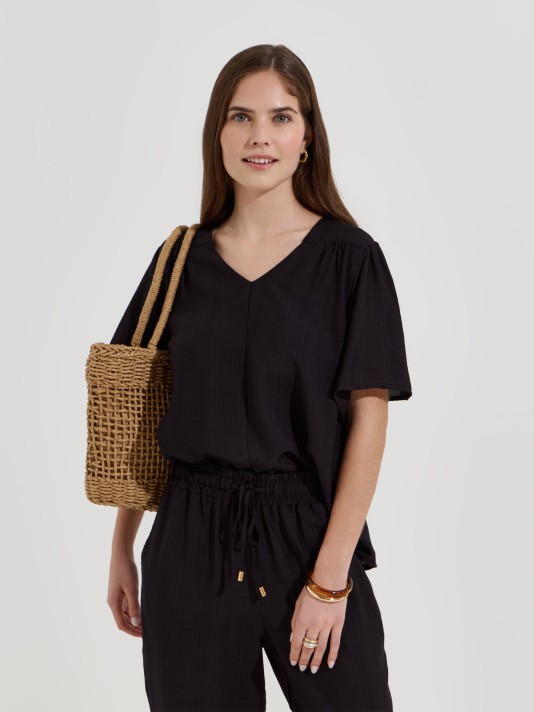 Blusa flu�da estampada decote em V