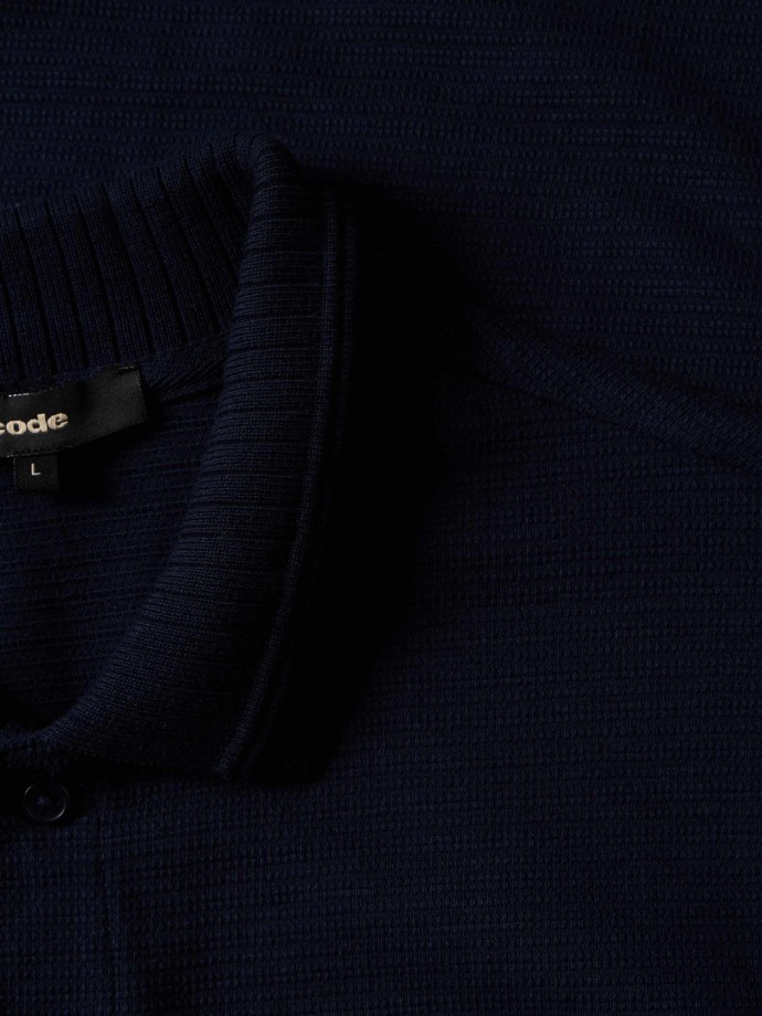 Polo de malha com bolso