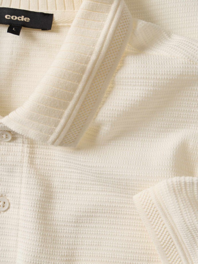 Polo de malha com bolso