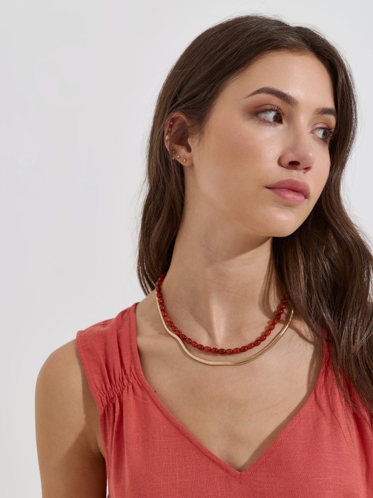 Blusa flu�da de al�as largas