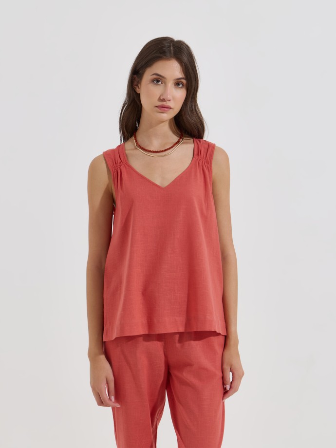 Blusa flu�da de al�as largas