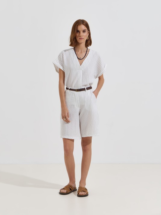 Blusa às riscas com detalhe cruzado Blusa às riscas com detalhe cruzado