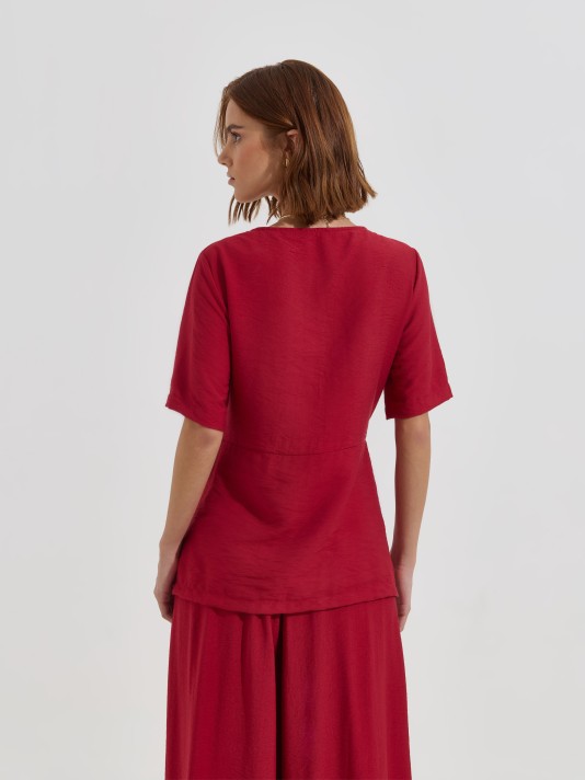 Blusa cruzada com laço lateral Blusa cruzada com laço lateral