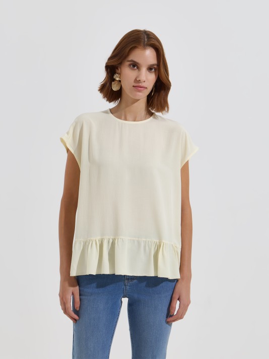 Blusa com folho Blusa com folho