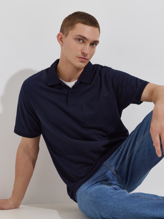 Polo de malha com bolso