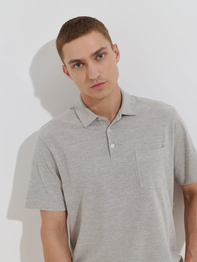 Polo bicolor com bolso