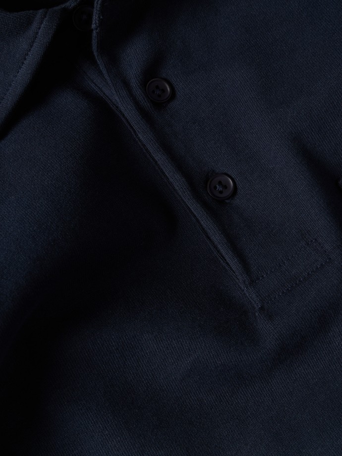 Polo de manga comprida com bolso