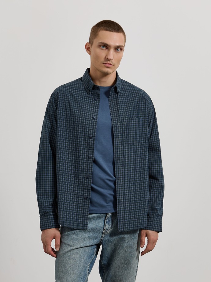 Camisa aos quadrados com bolso