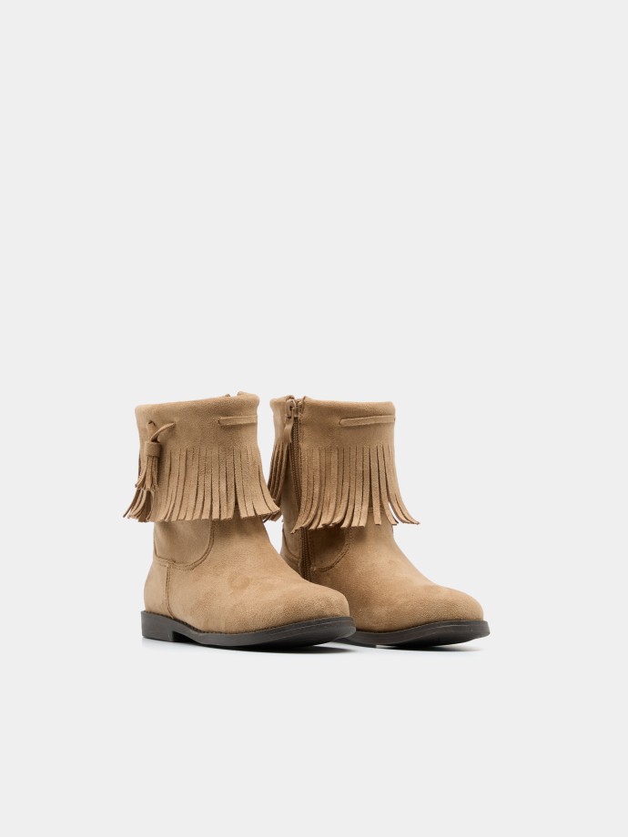 Botas com franjas