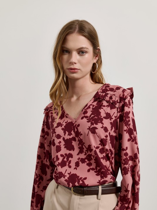 Blusa estampada com folho