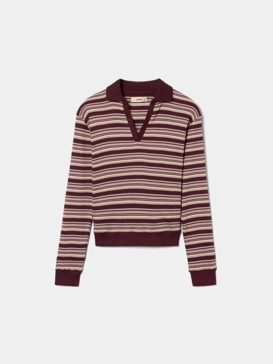 Polo de malha �s riscas