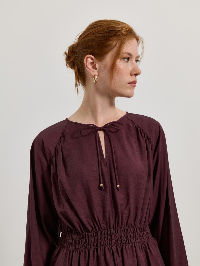 Blusa com cintura franzida