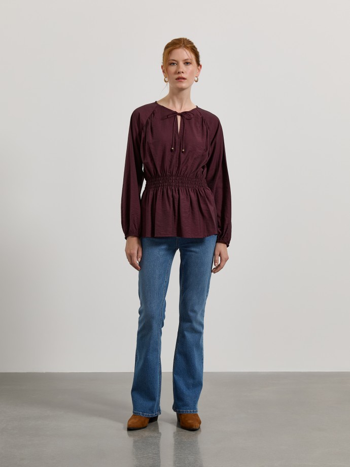 Blusa com cintura franzida