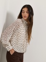 Blusa �s bolinhas com efeito bal�o