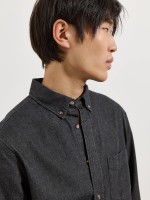 Camisa de ganga com bolso