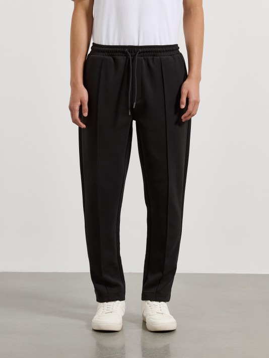 Calças jogger com nervura Calças jogger com nervura