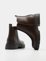 Ankle boots with zipper closure.