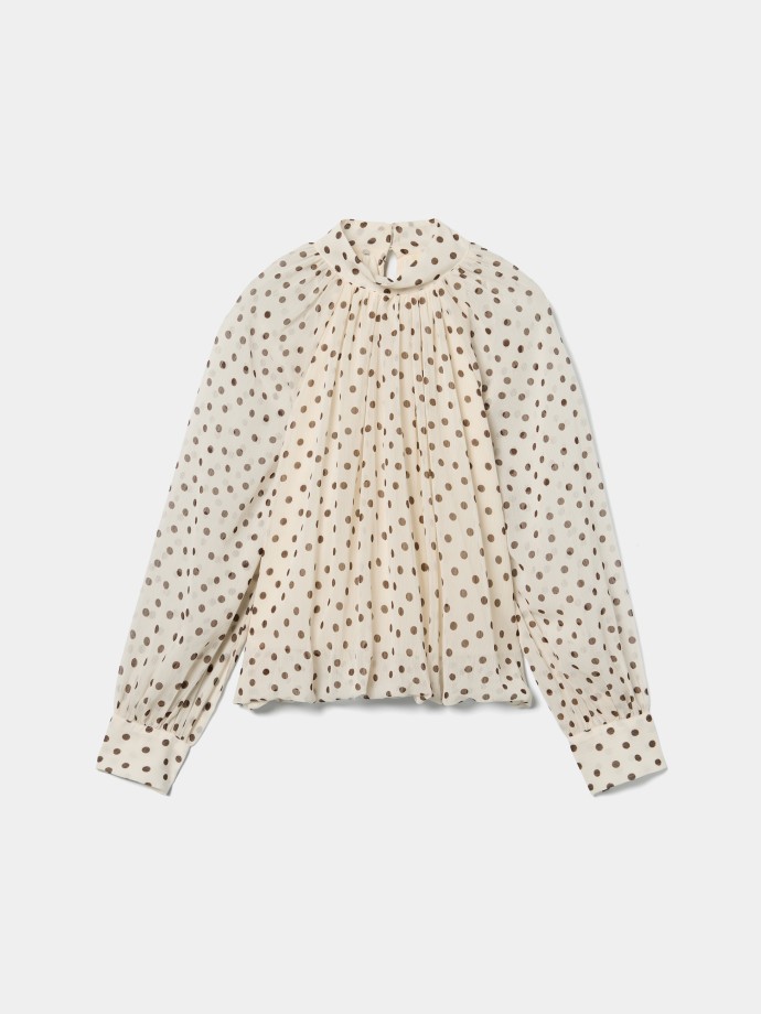 Blusa �s bolinhas com efeito bal�o