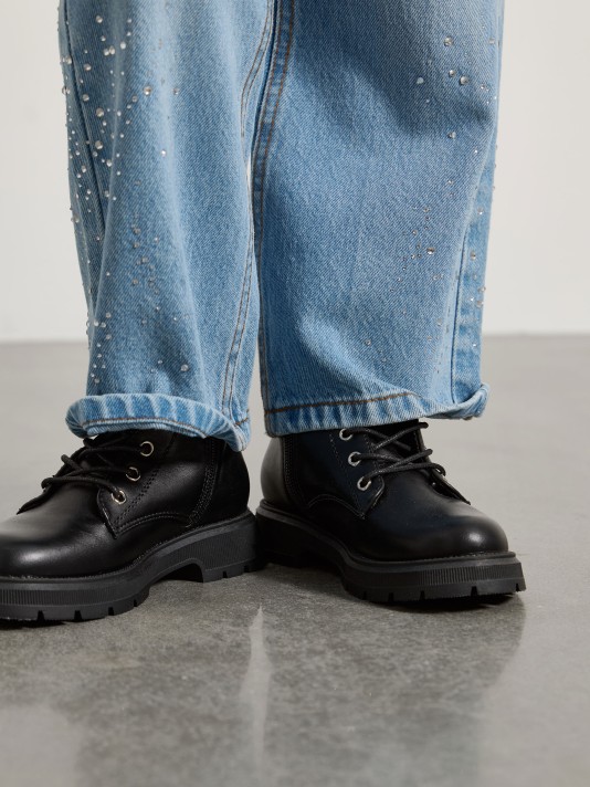 Bota preta de cano alto