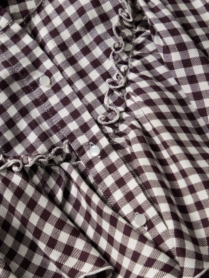 Camisa xadrez com folhos